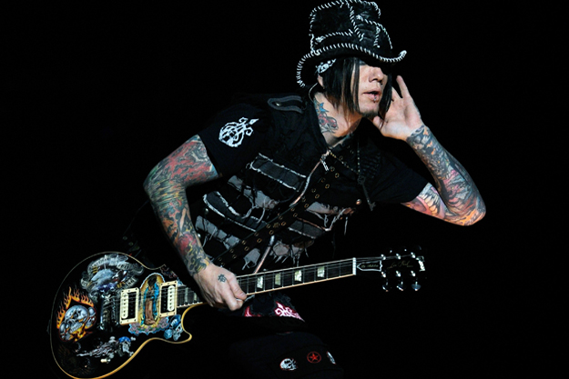 LAS VEGAS, NV - DECEMBER 30:  Guitarist DJ Ashba of Guns N' Roses performs at The Joint inside the Hard Rock Hotel & Casino December 30, 2011 in Las Vegas, Nevada.  (Photo by Ethan Miller/Getty Images)