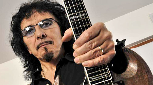 LONDON, UNITED KINGDOM - MARCH 30: Guitarist Tony Iommi, a founding member of the British rock band Black Sabbath. During a portrait shoot on March 30, 2010. Holding his signature Jaydee SG Old Boy guitar. (Photo by Joby Sessions/Total Guitar Magazine)  Tony Iommi  . CONTACT: Future Publishing Limited 30 Monmouth St, Bath, UK, BA1 2BW +44 (0)1225 442244 licensing@futurenet.com www.futurelicensing.com, www.futureplc.com